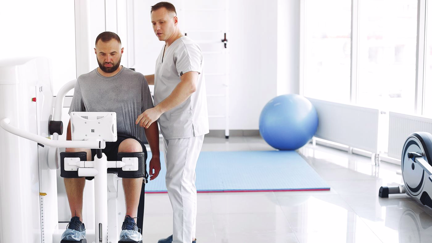Physiotherapist treating a patient